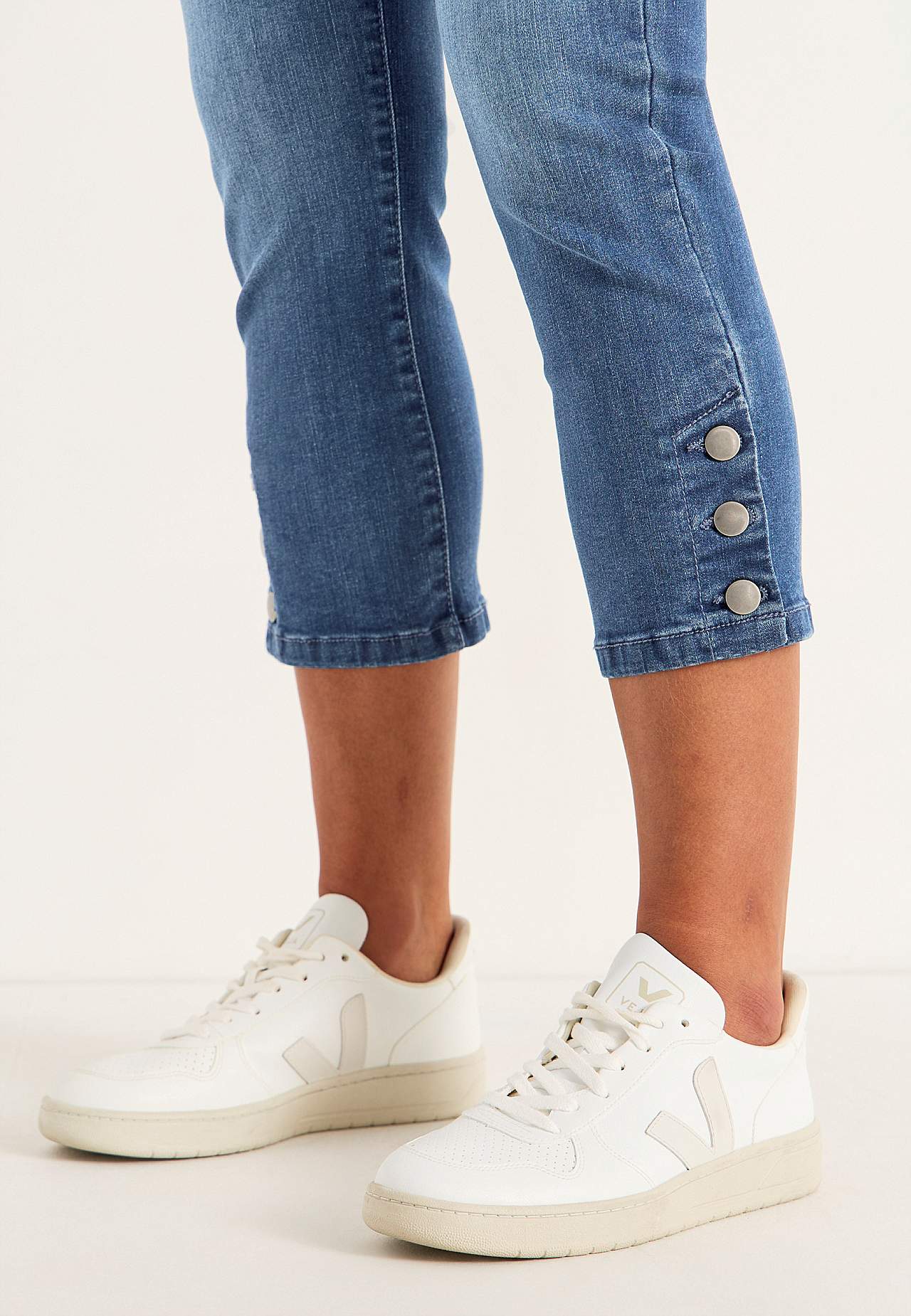 Caprijeans med femficksdesign