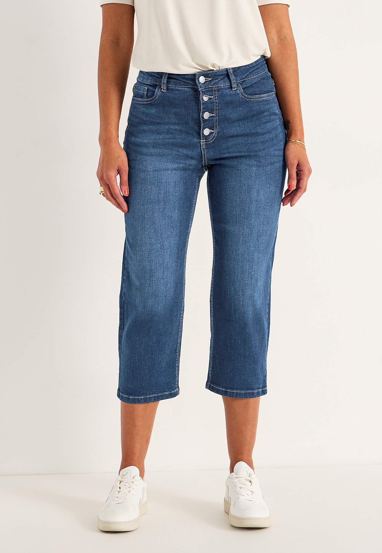 Caprijeans med knappgylf