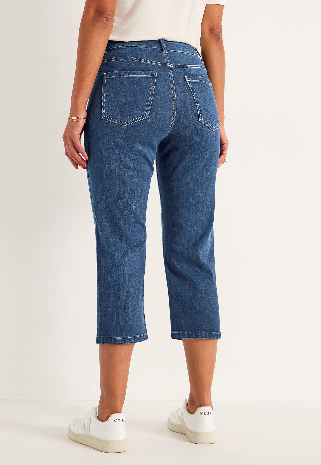 Caprijeans med knappgylf