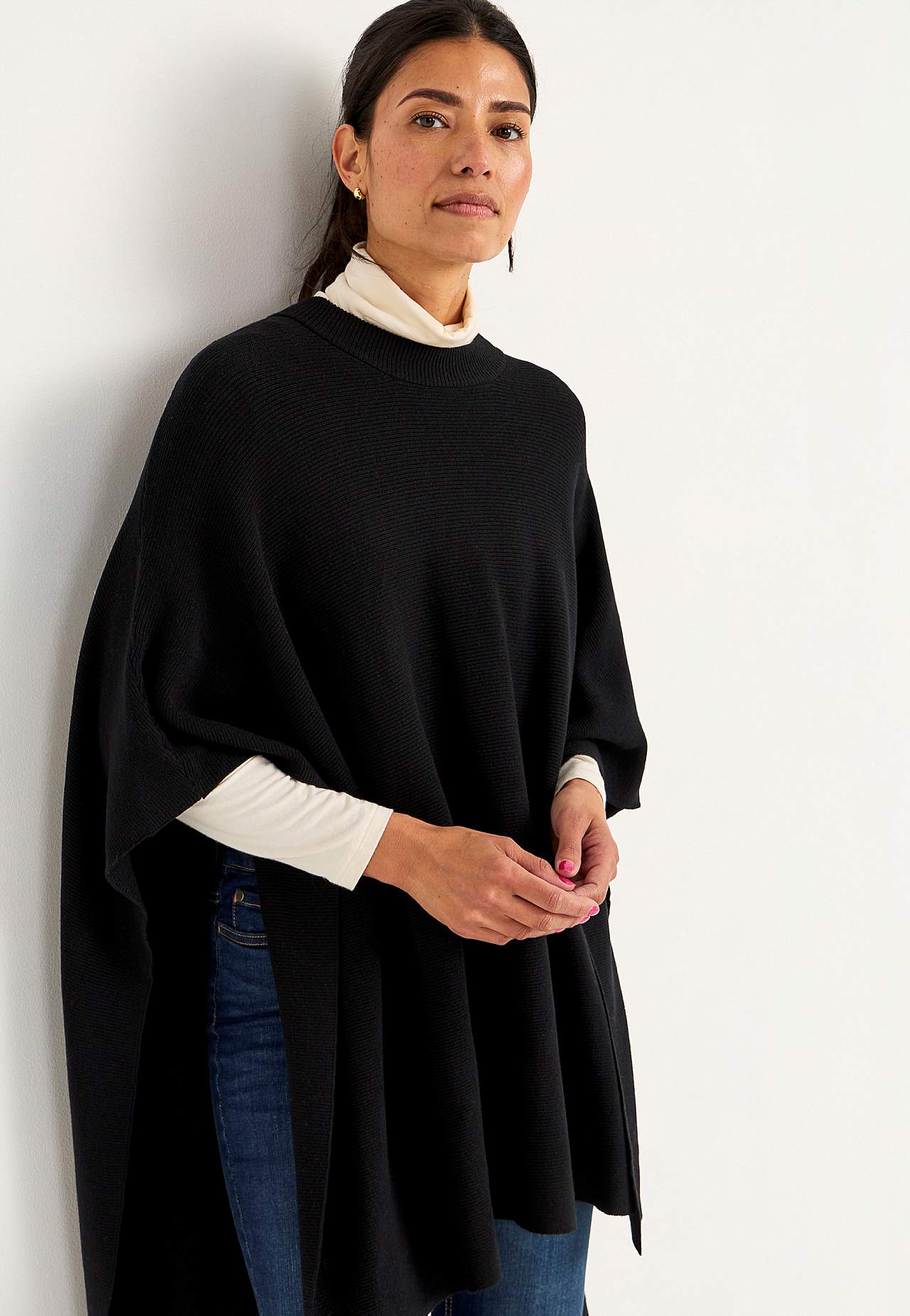 Finstickad poncho