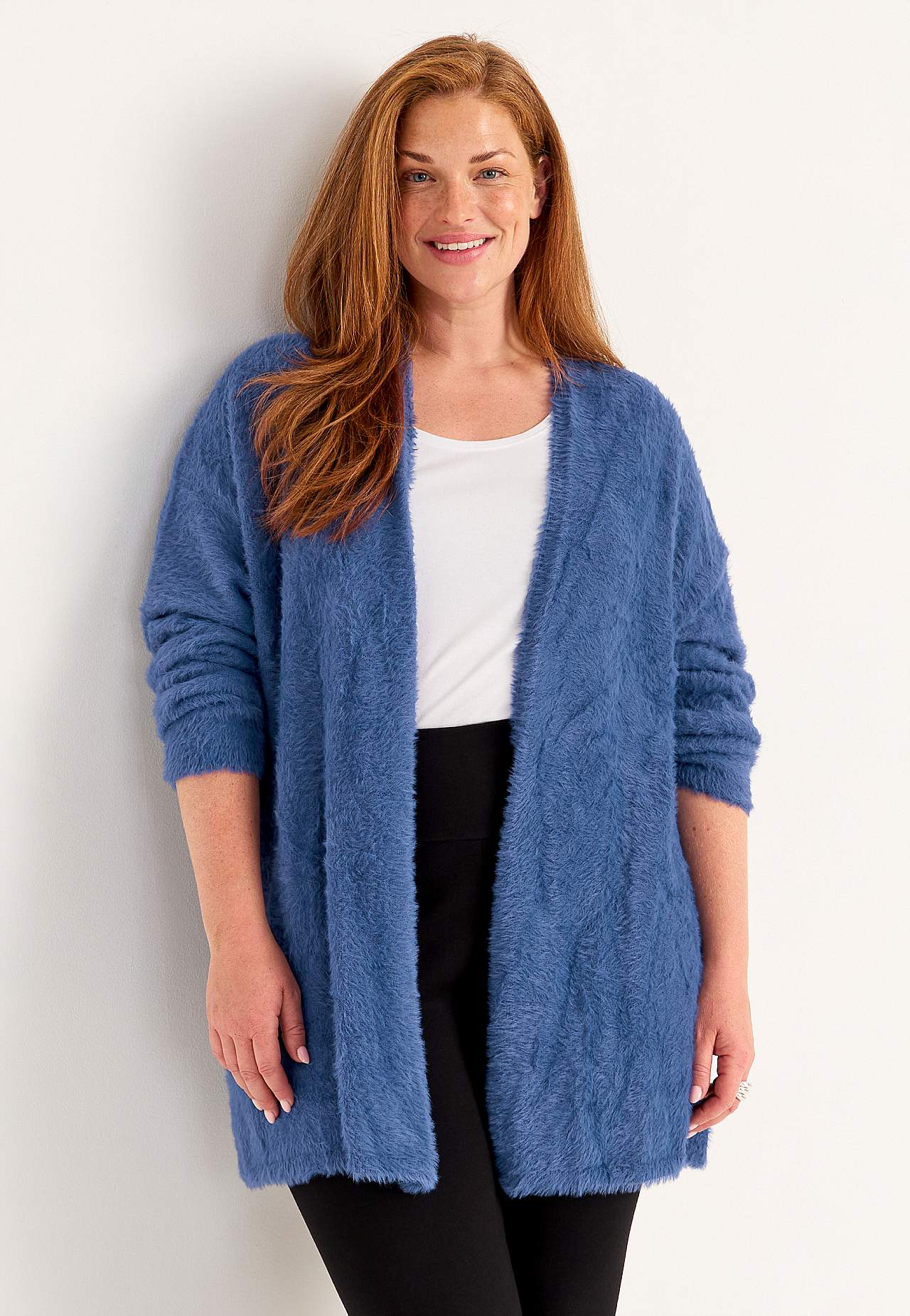 Stickad, öppen cardigan