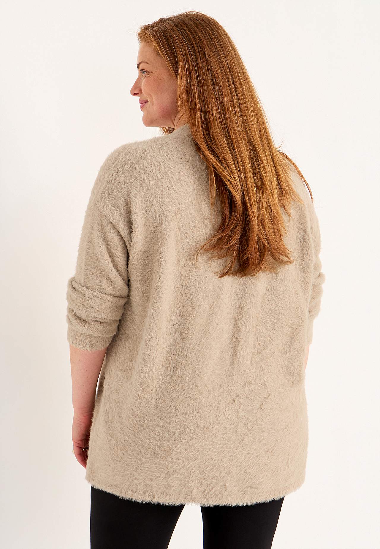 Stickad, öppen cardigan