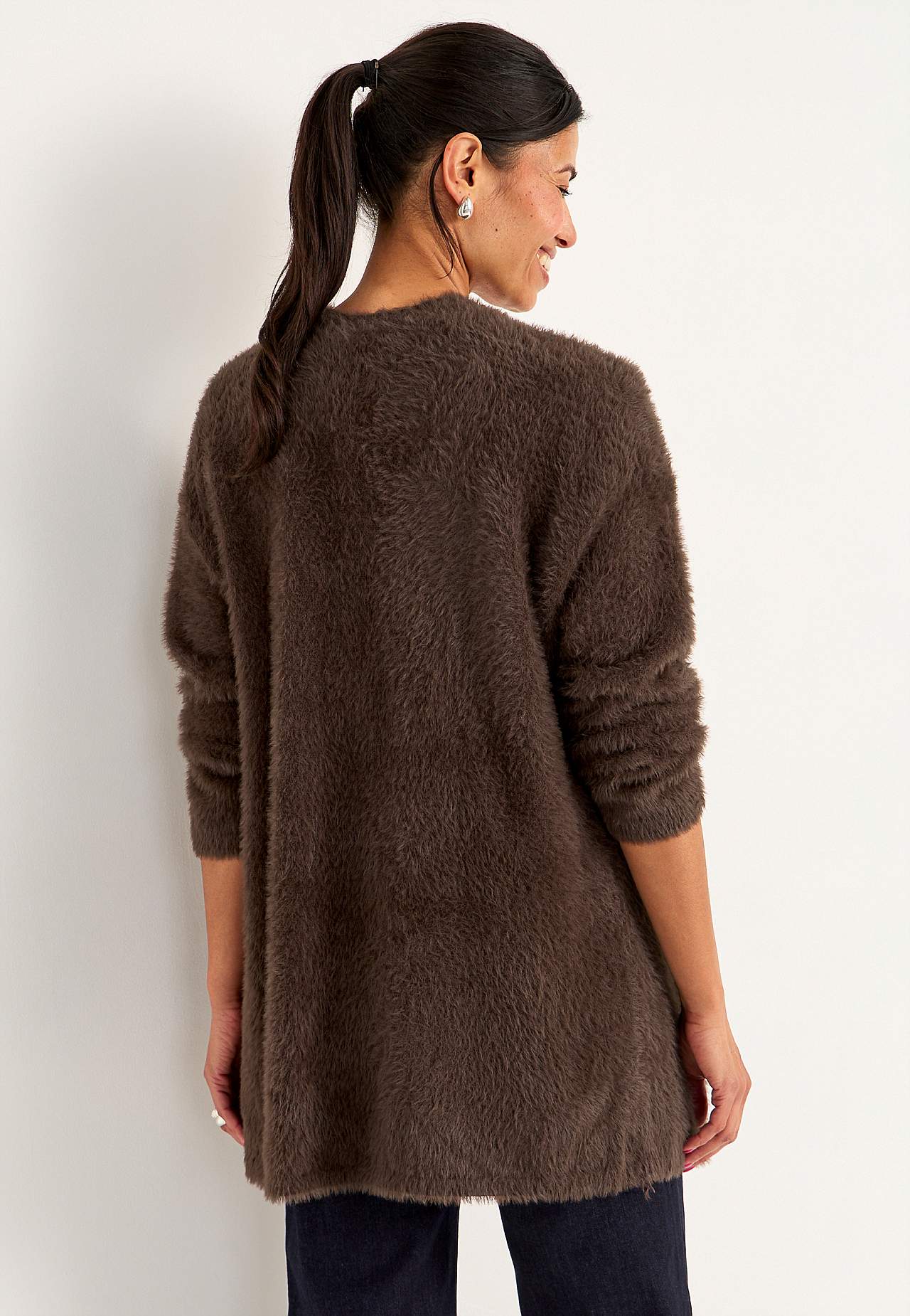 Stickad, öppen cardigan