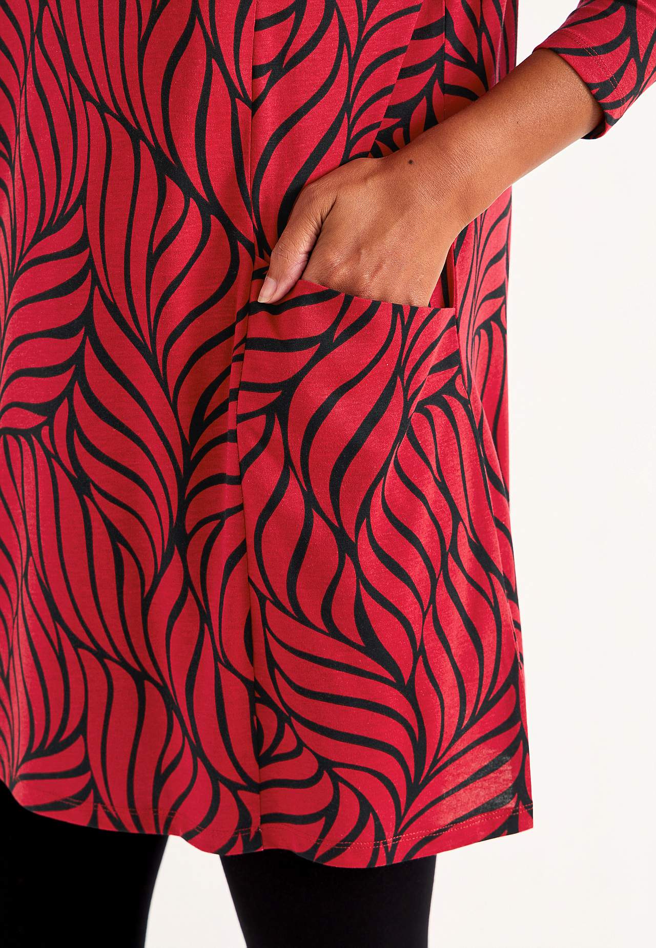 Trikåtunika med fickor