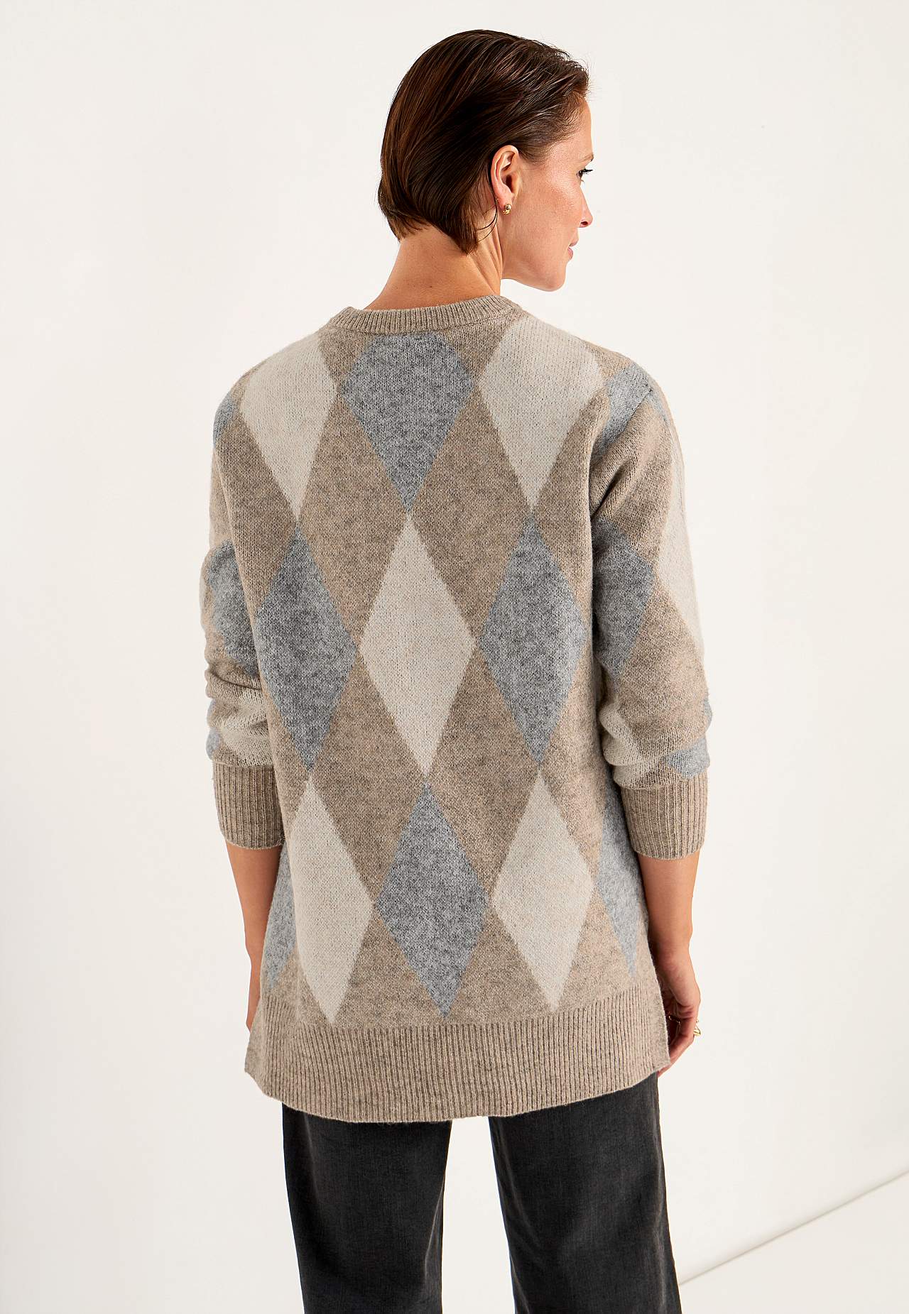 Stickad tunika med slitsar