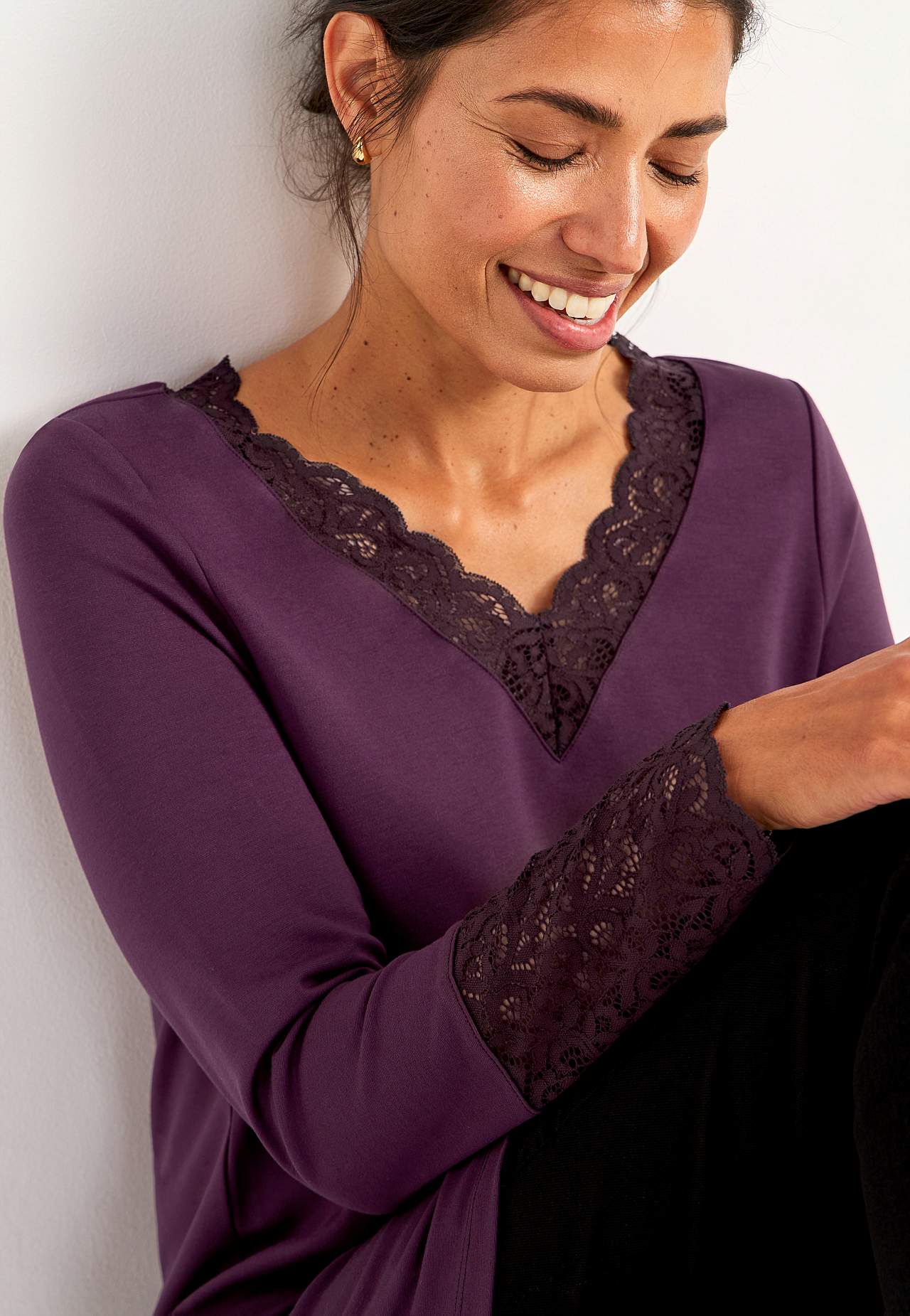 Trikåtunika med spetsdetaljer