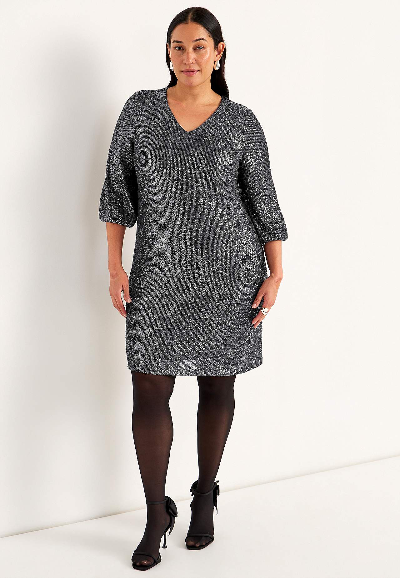 V-ringad paljettklänning