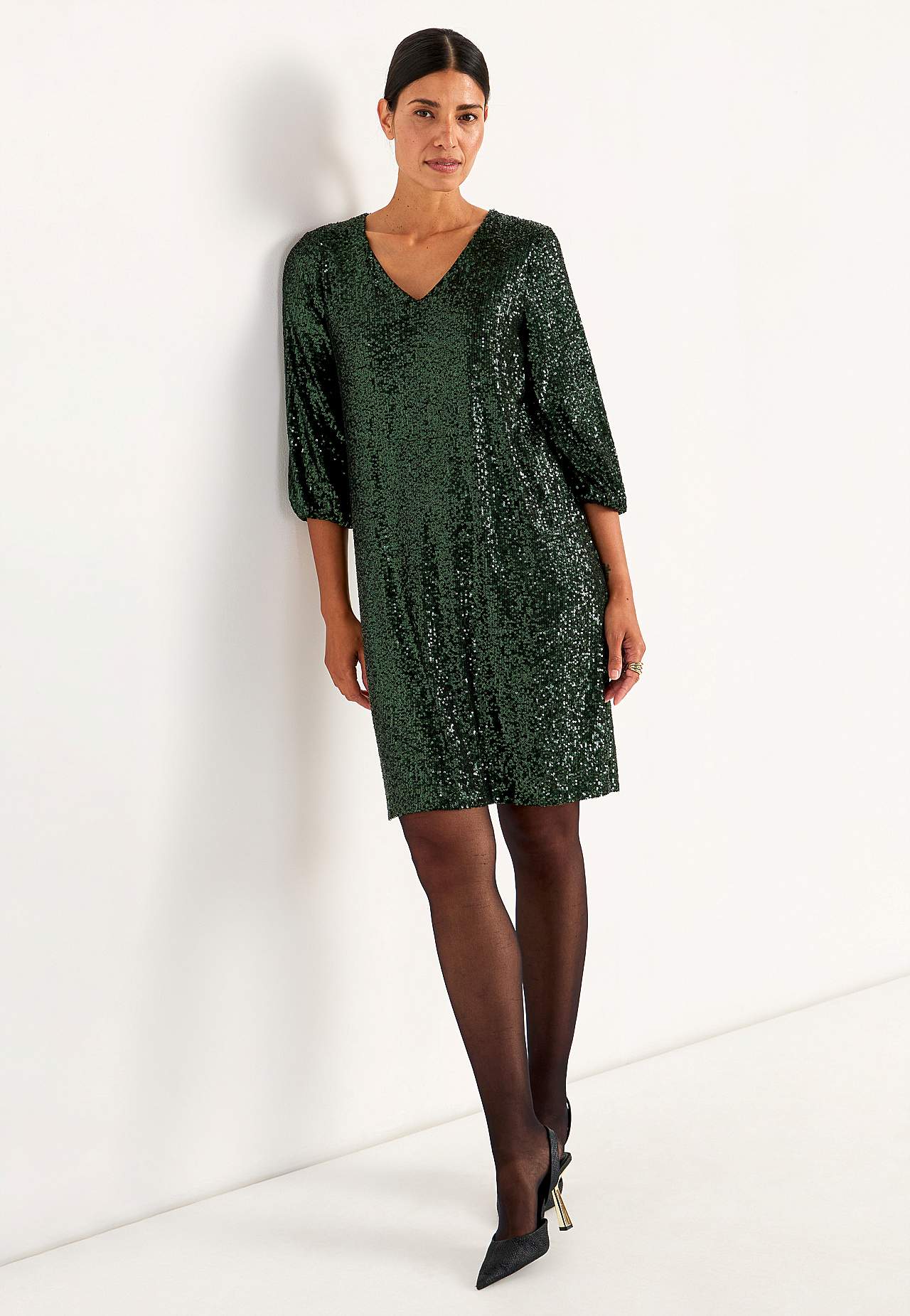 V-ringad paljettklänning