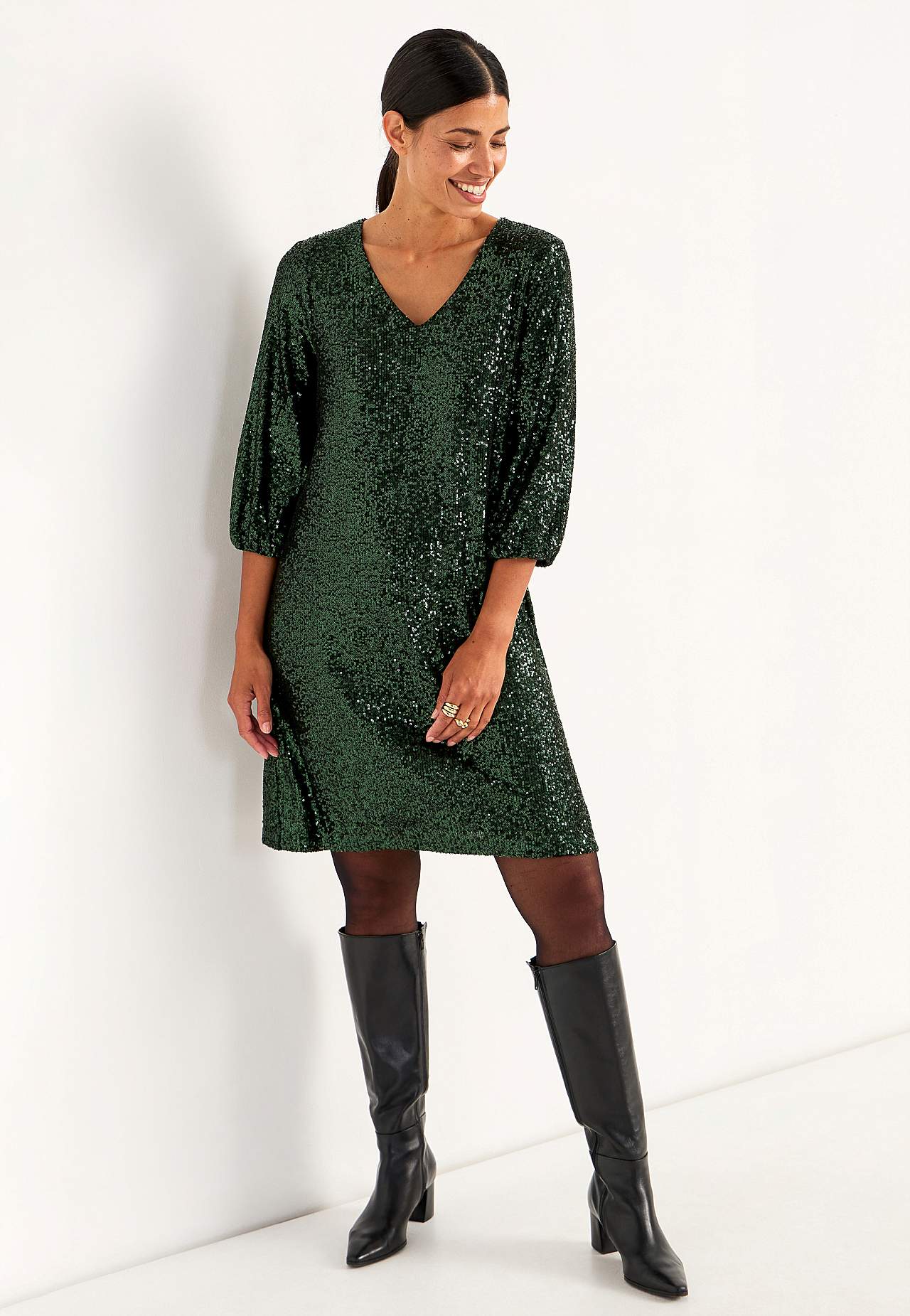 V-ringad paljettklänning