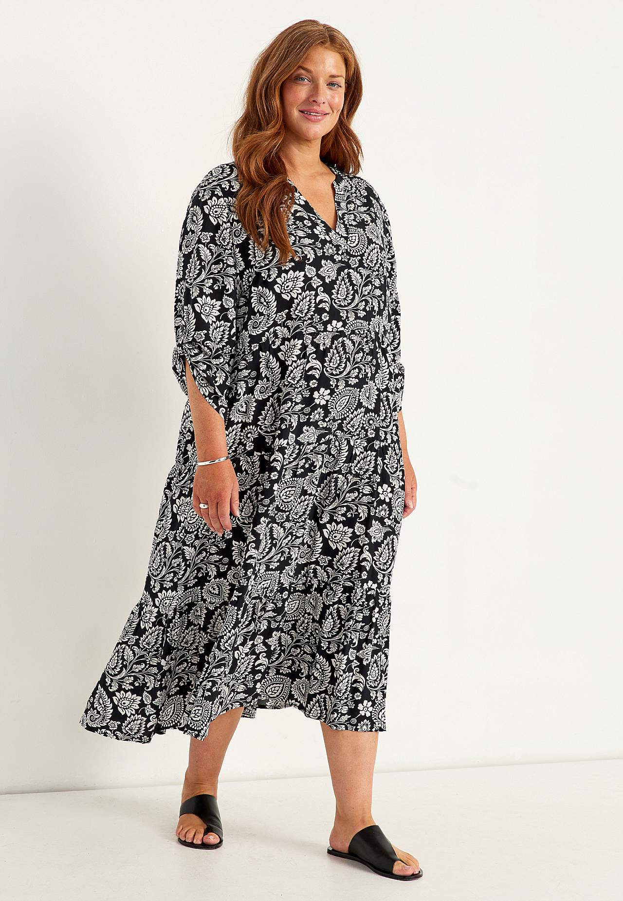 Klänning med volanger