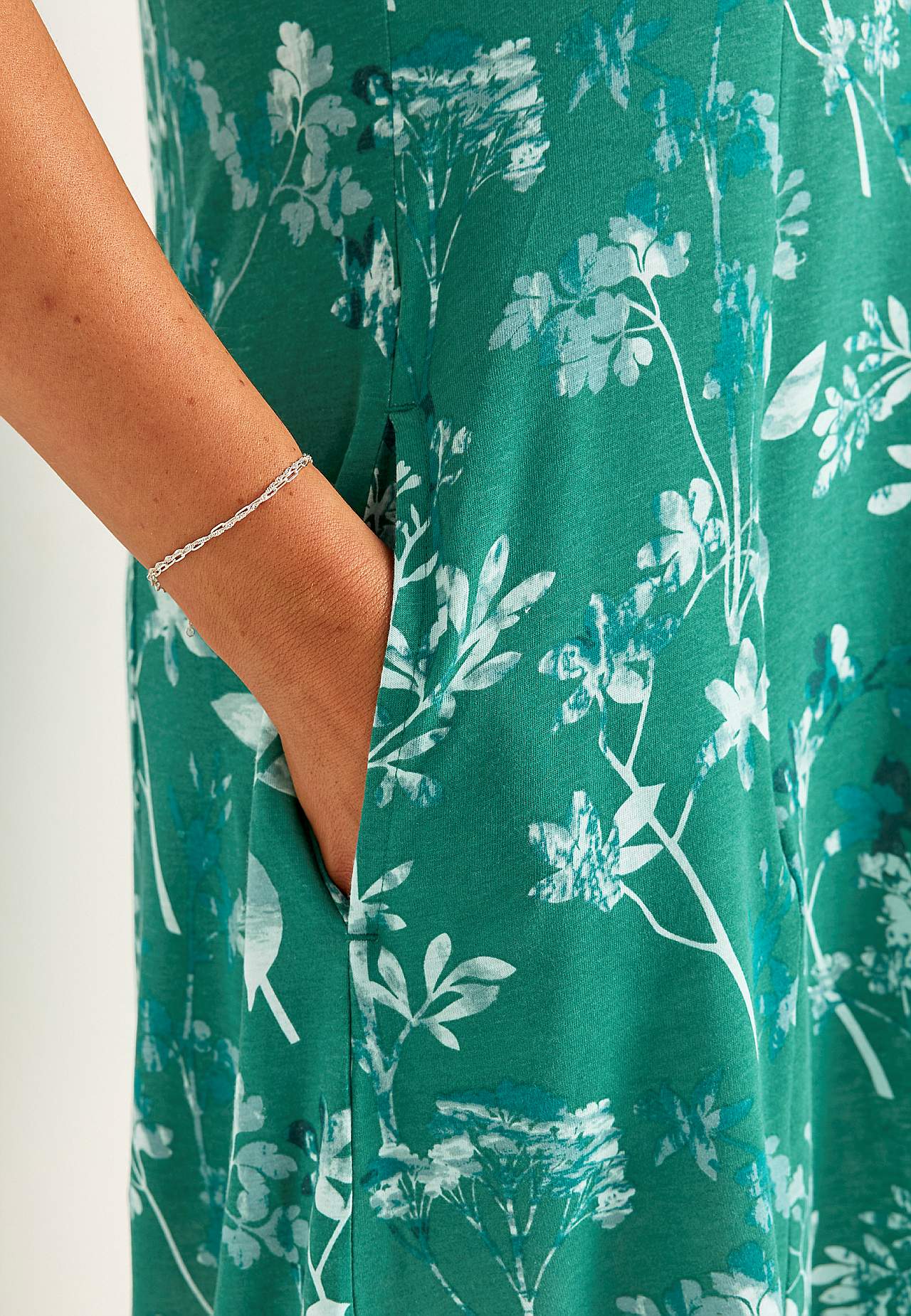 Mönstrad trikåklänning med fickor