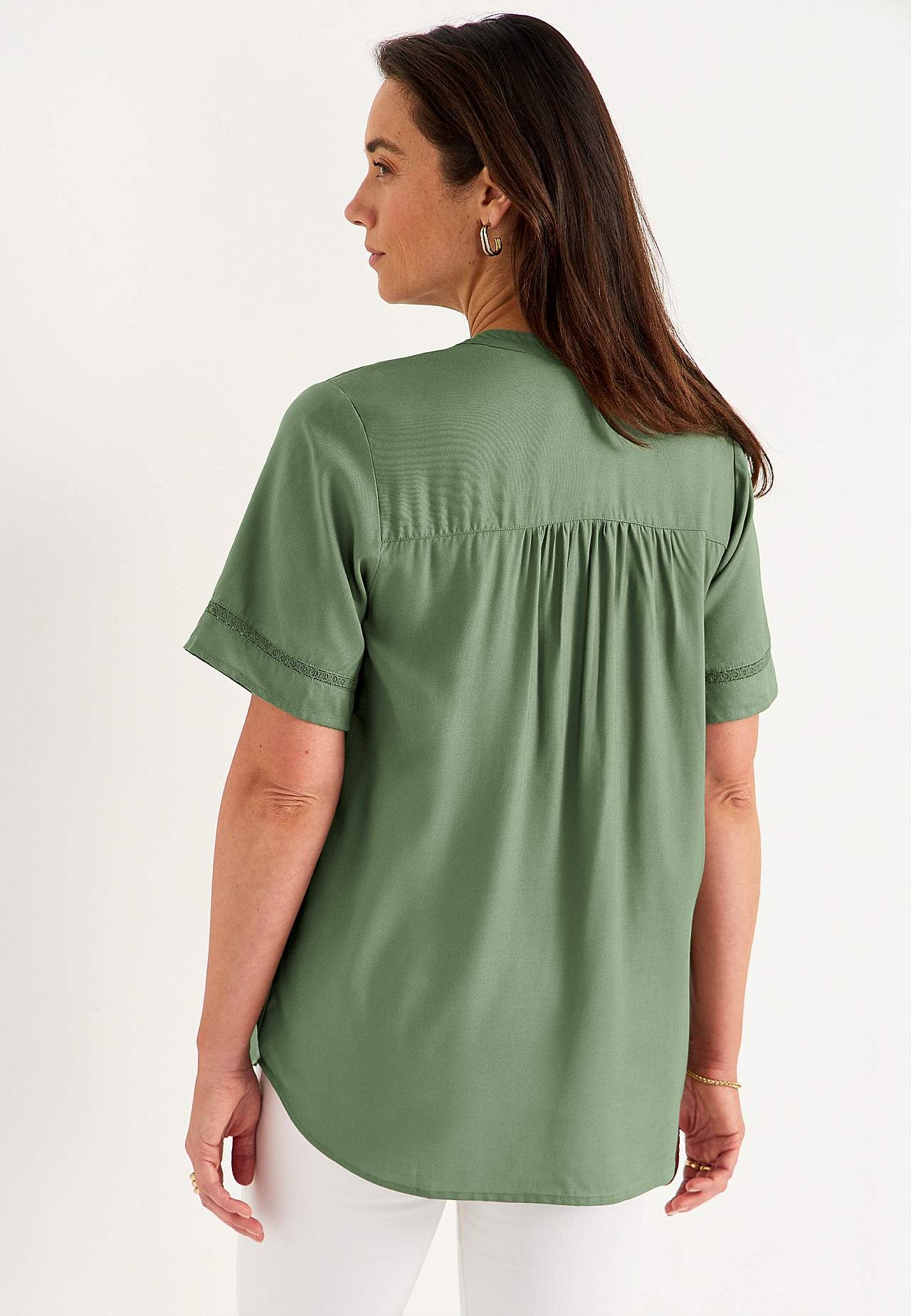 Vävd tunika med spetsdetaljer