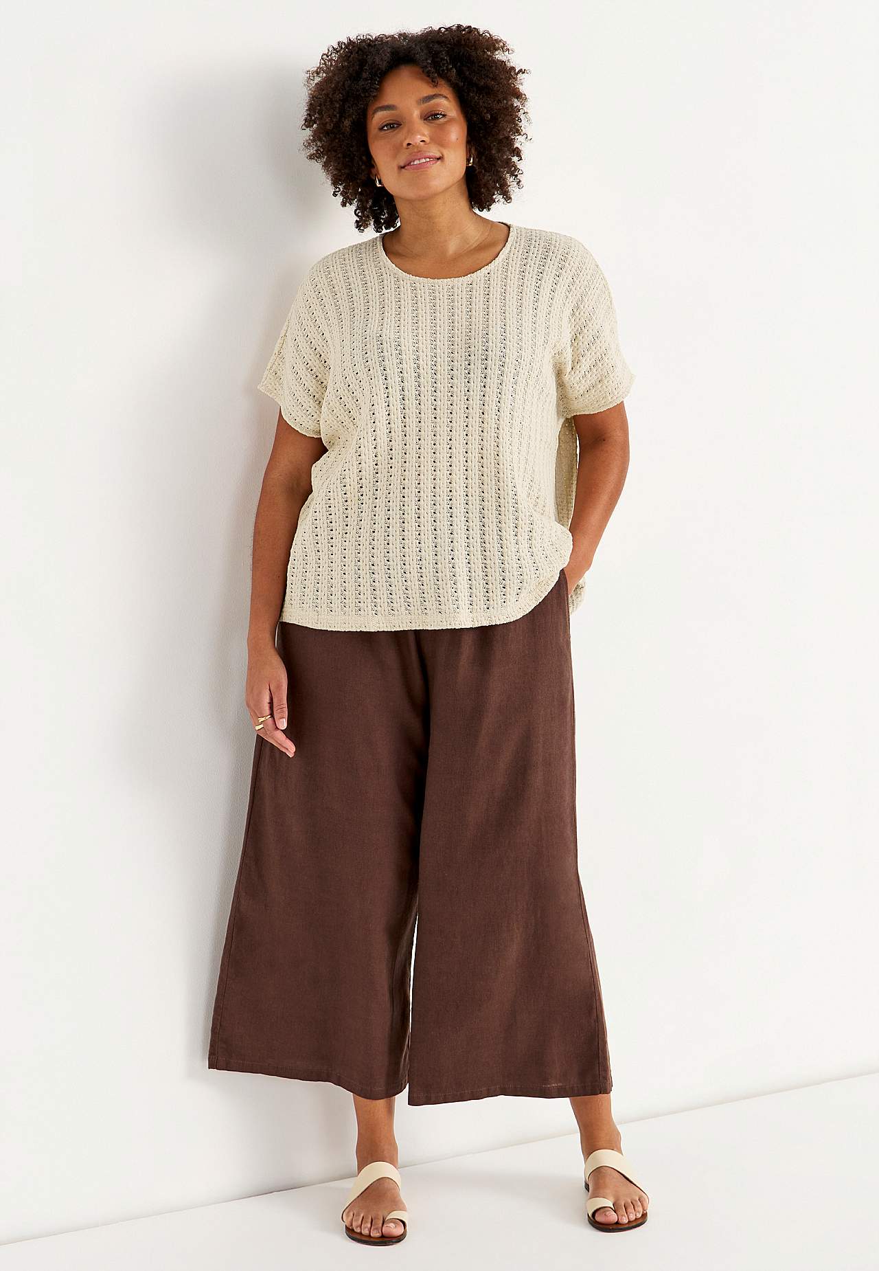 Trikåtopp med hålmönster