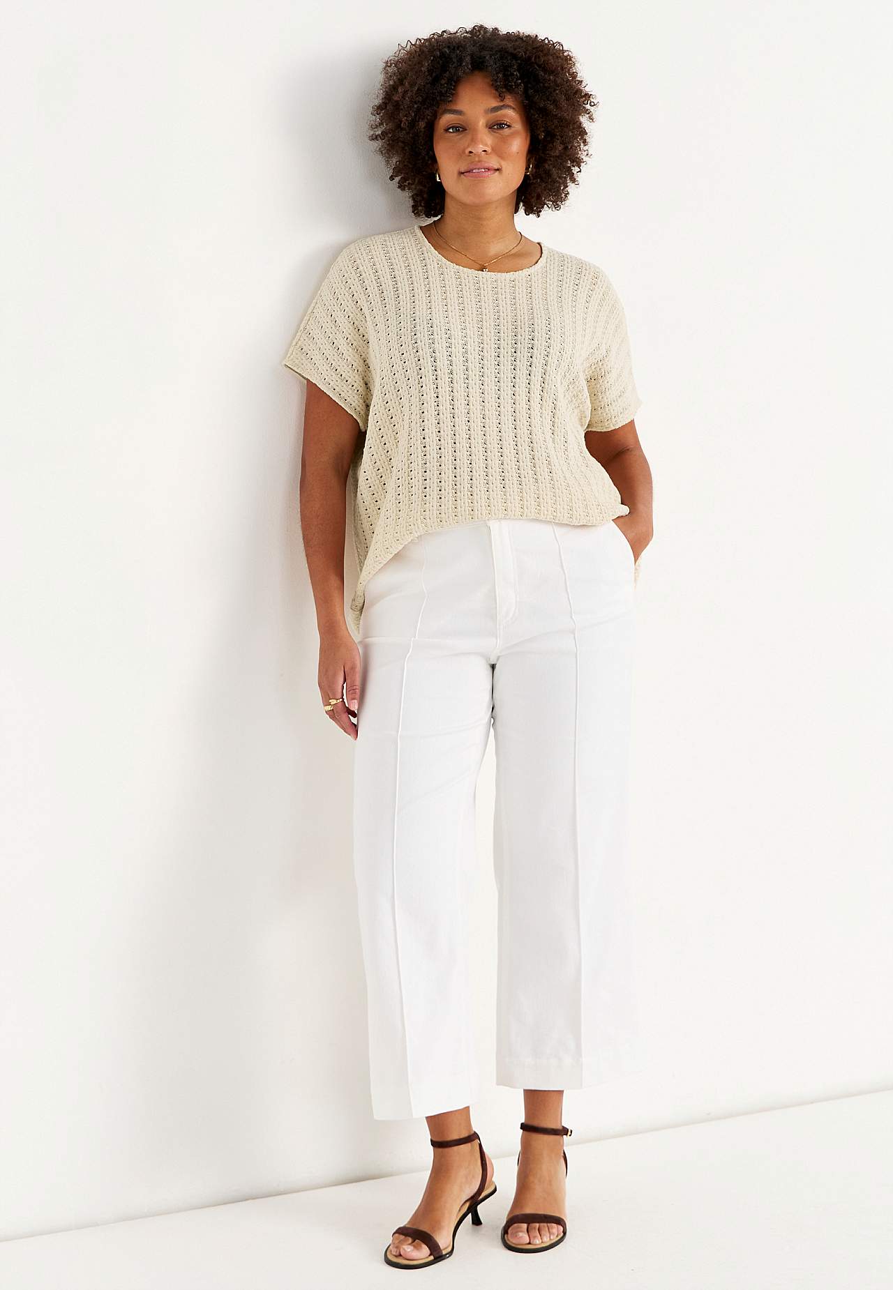 Trikåtopp med hålmönster