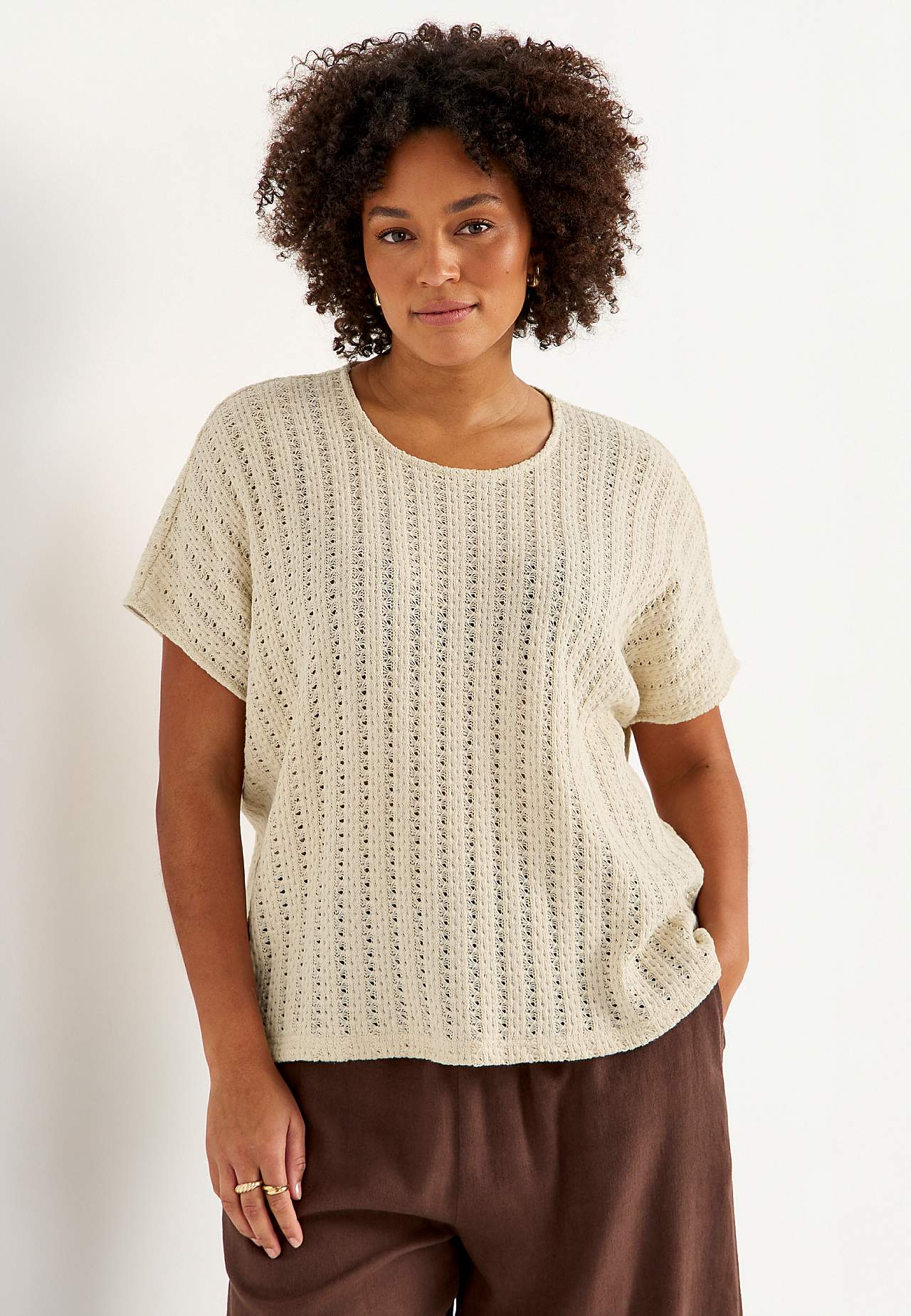 Trikåtopp med hålmönster