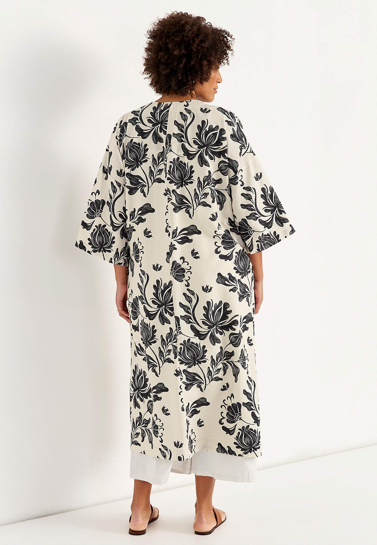 Öppen kaftan med fickor