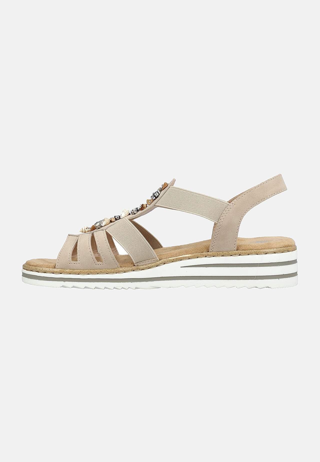 Sandal med dekorativa snäckskal och stenar