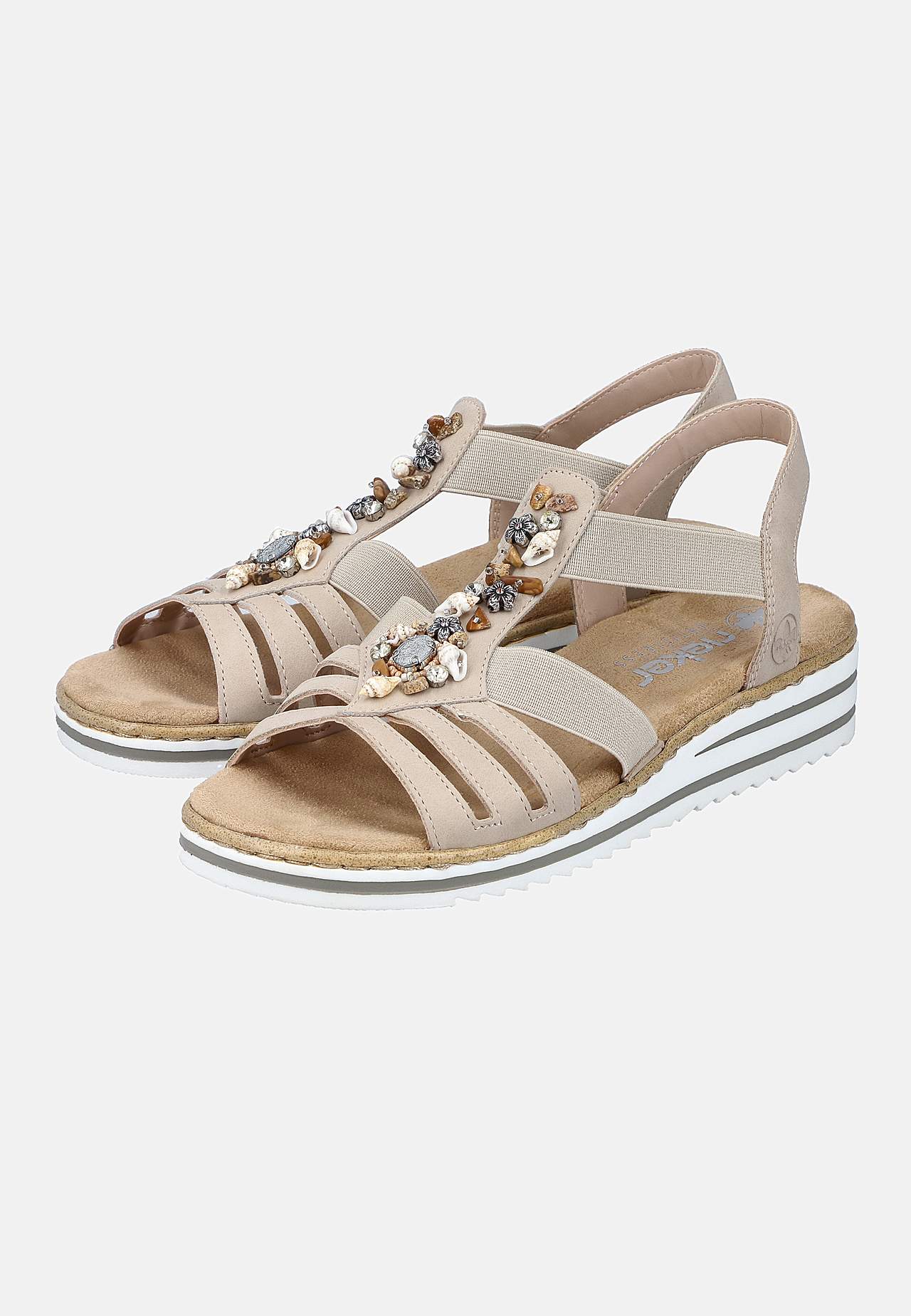 Sandal med dekorativa snäckskal och stenar