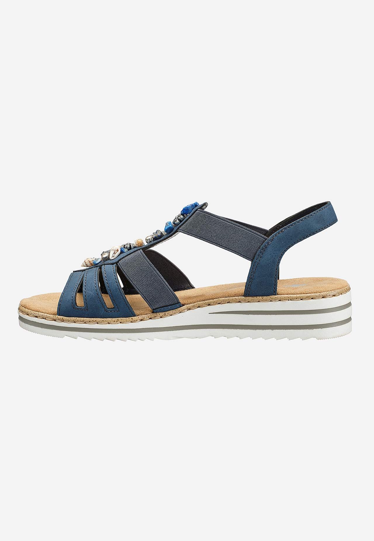 Sandal med dekorativa snäckskal och stenar