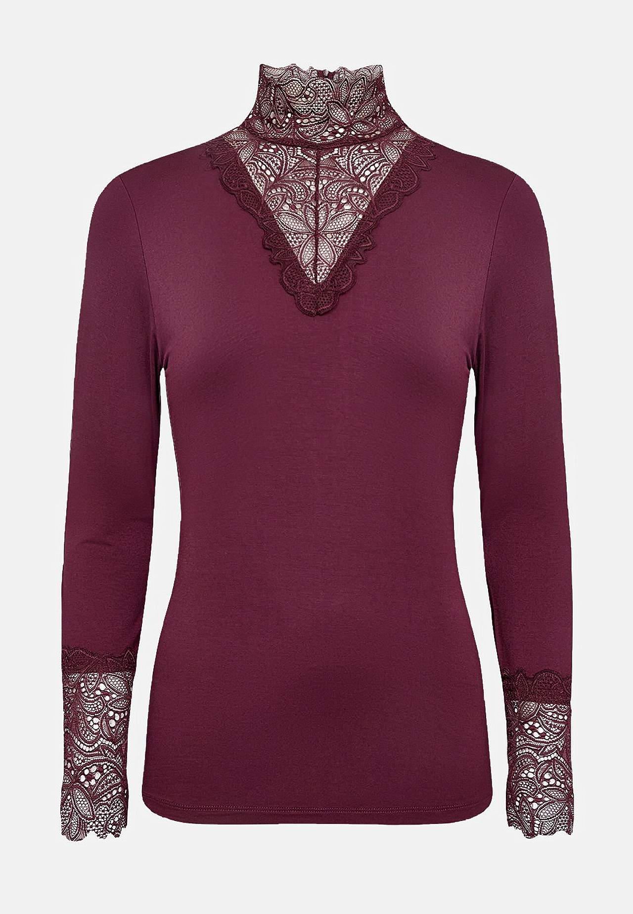 Trikåtopp med spetsdetaljer