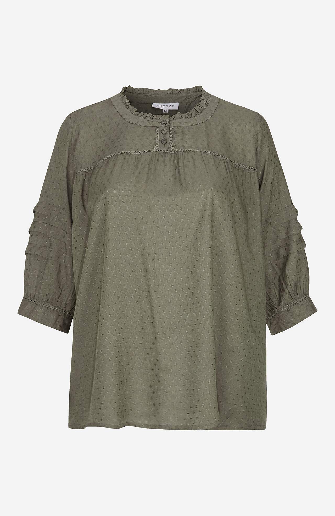 Blus med strukturmönster