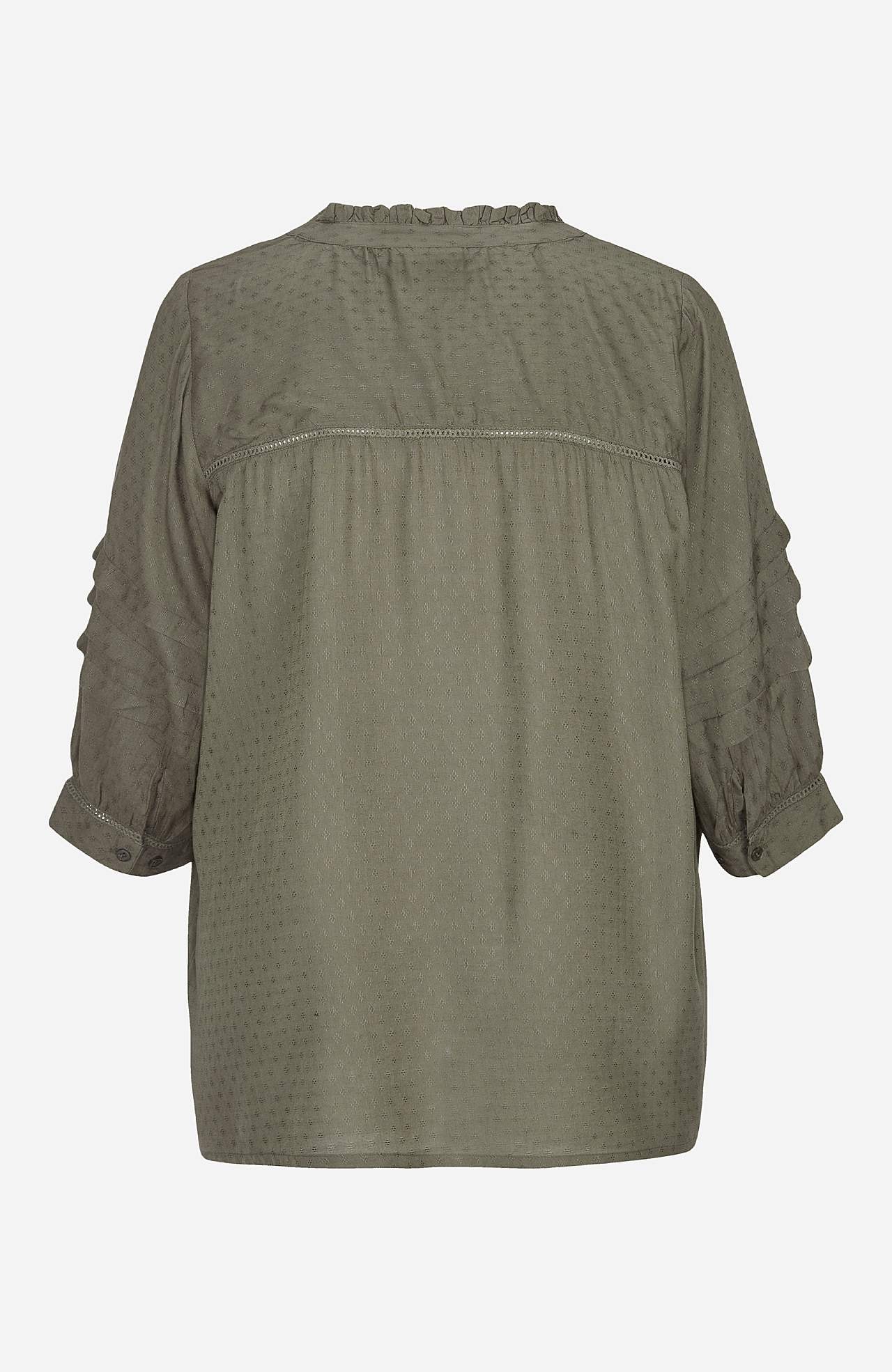 Blus med strukturmönster