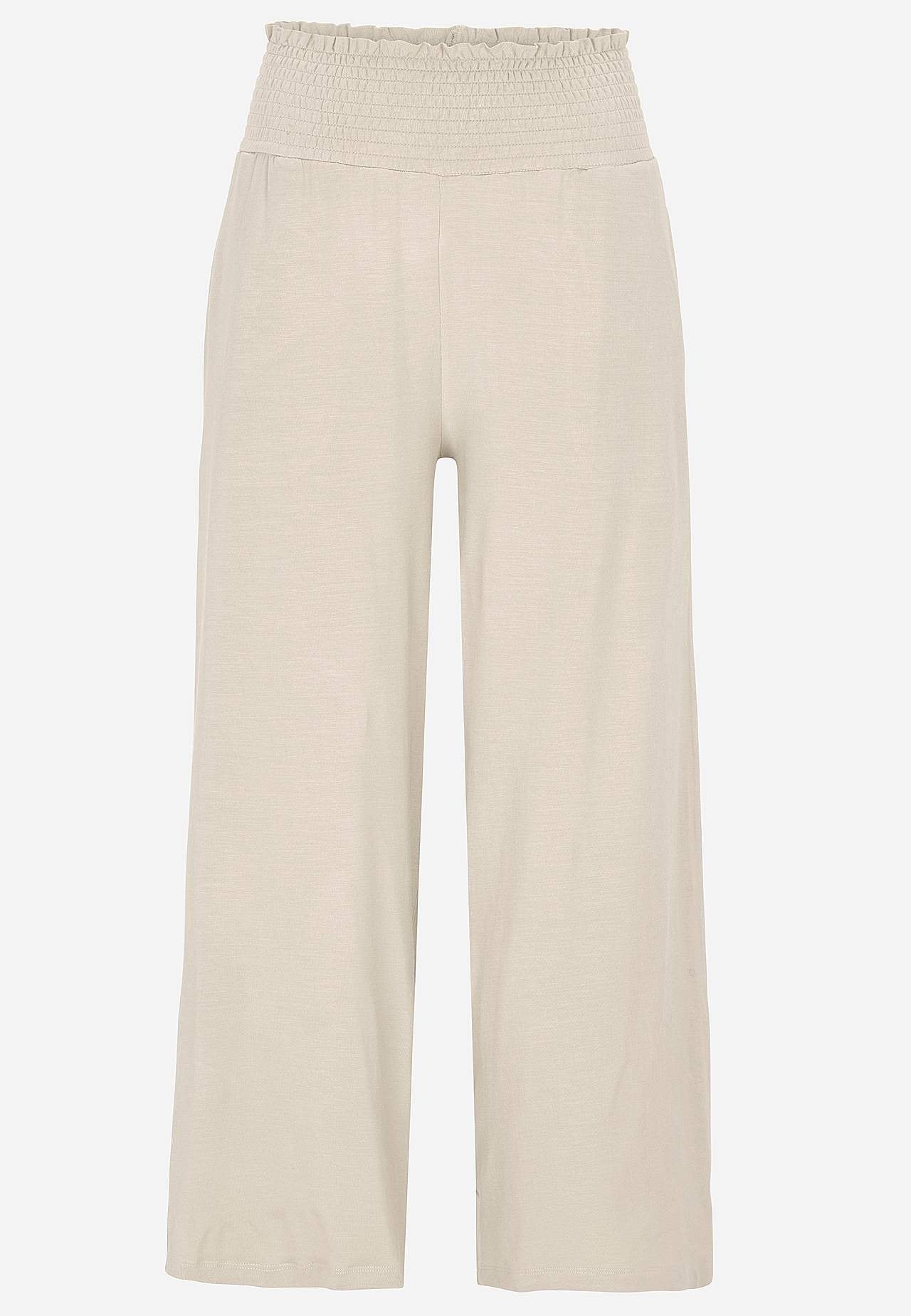 Mjuk trikåbyxa med smockad resårmidja Liv