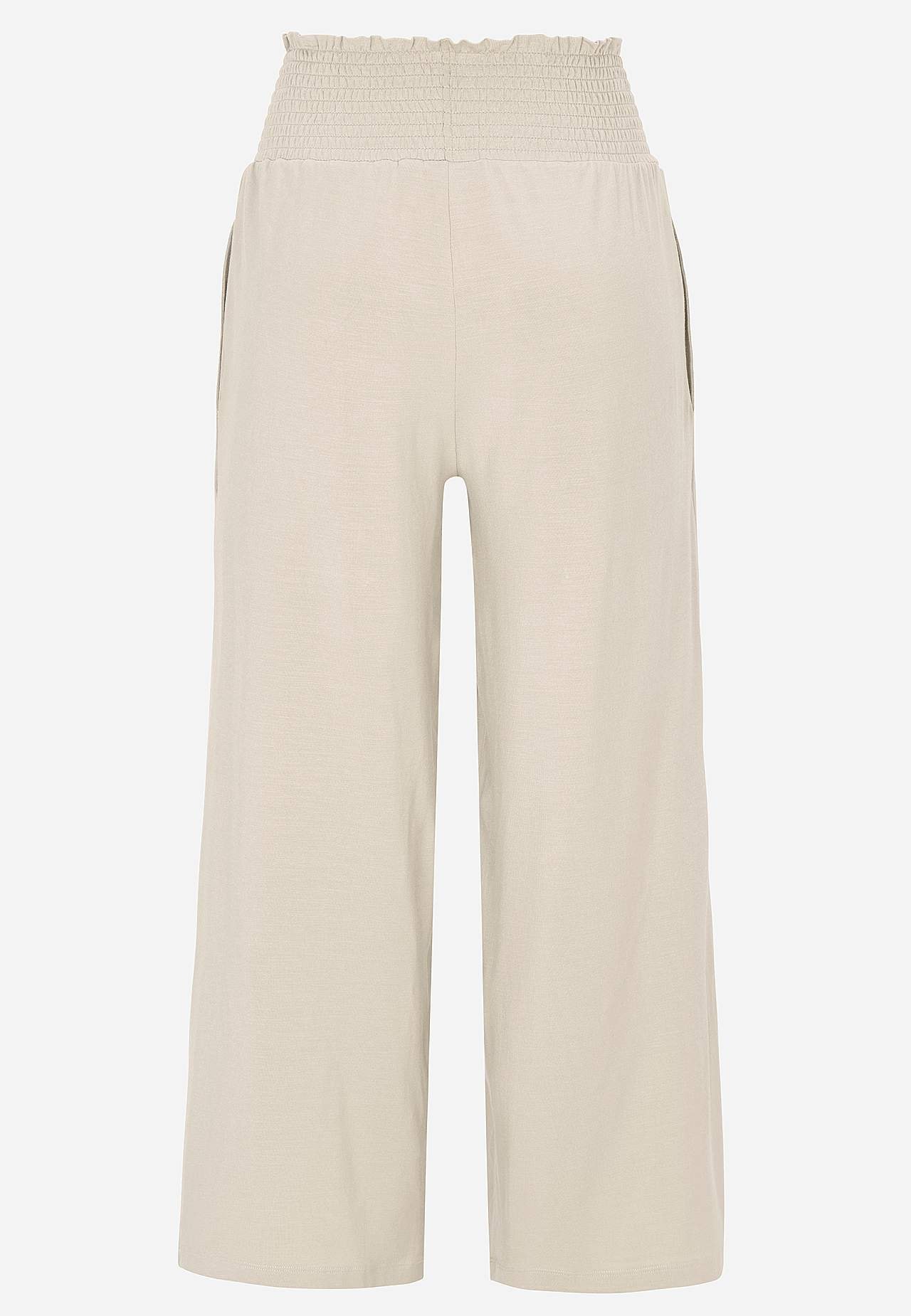 Mjuk trikåbyxa med smockad resårmidja Liv