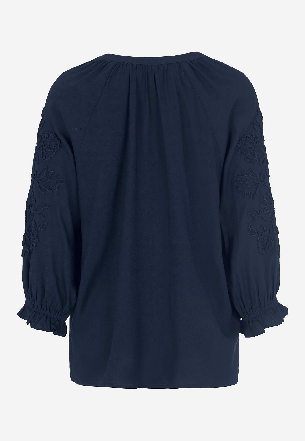 Blus med brodyr