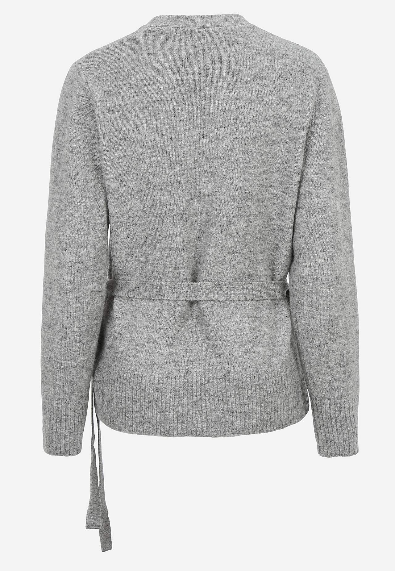 Stickad cardigan med omlottdesign