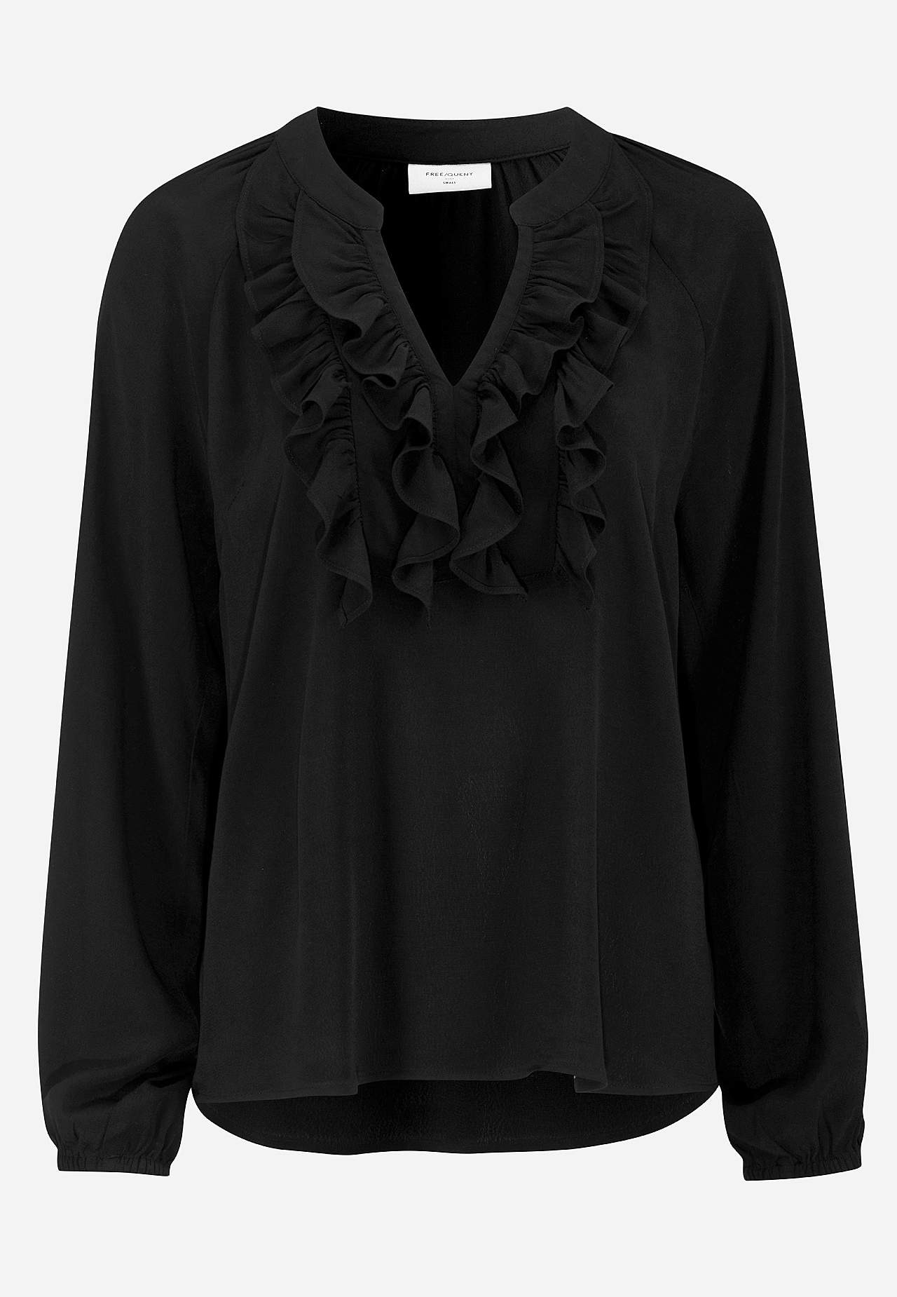 Blus med volanger