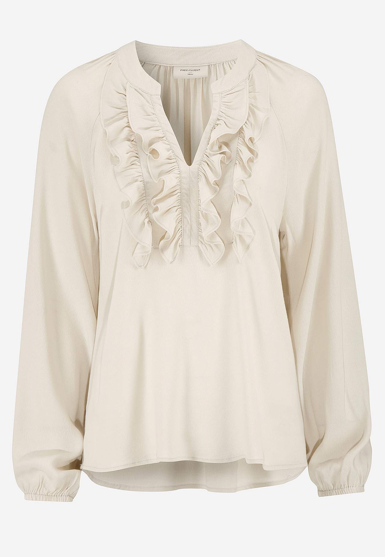Blus med volanger