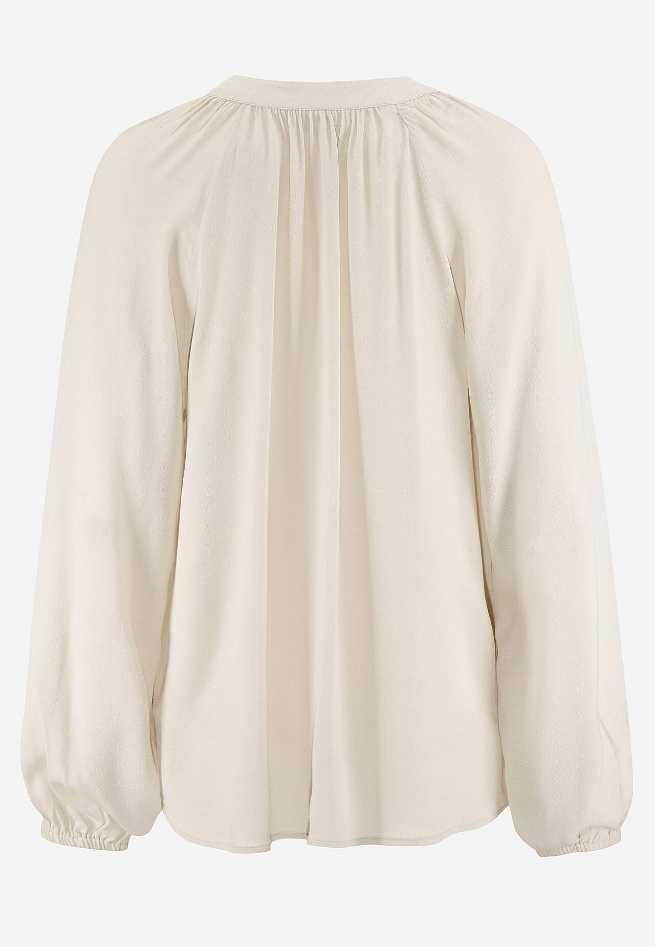 Blus med volanger