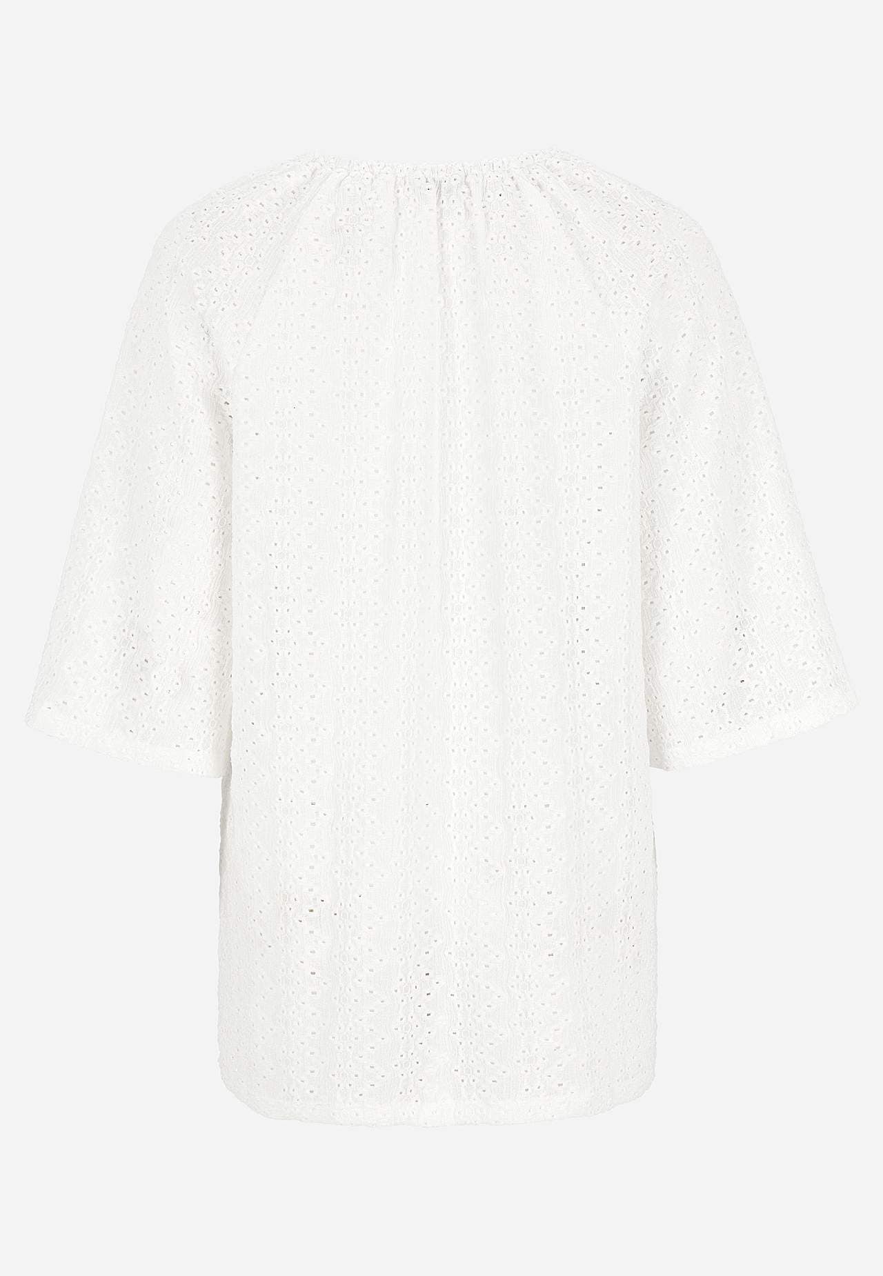 Trikåtunika med hålbroderi