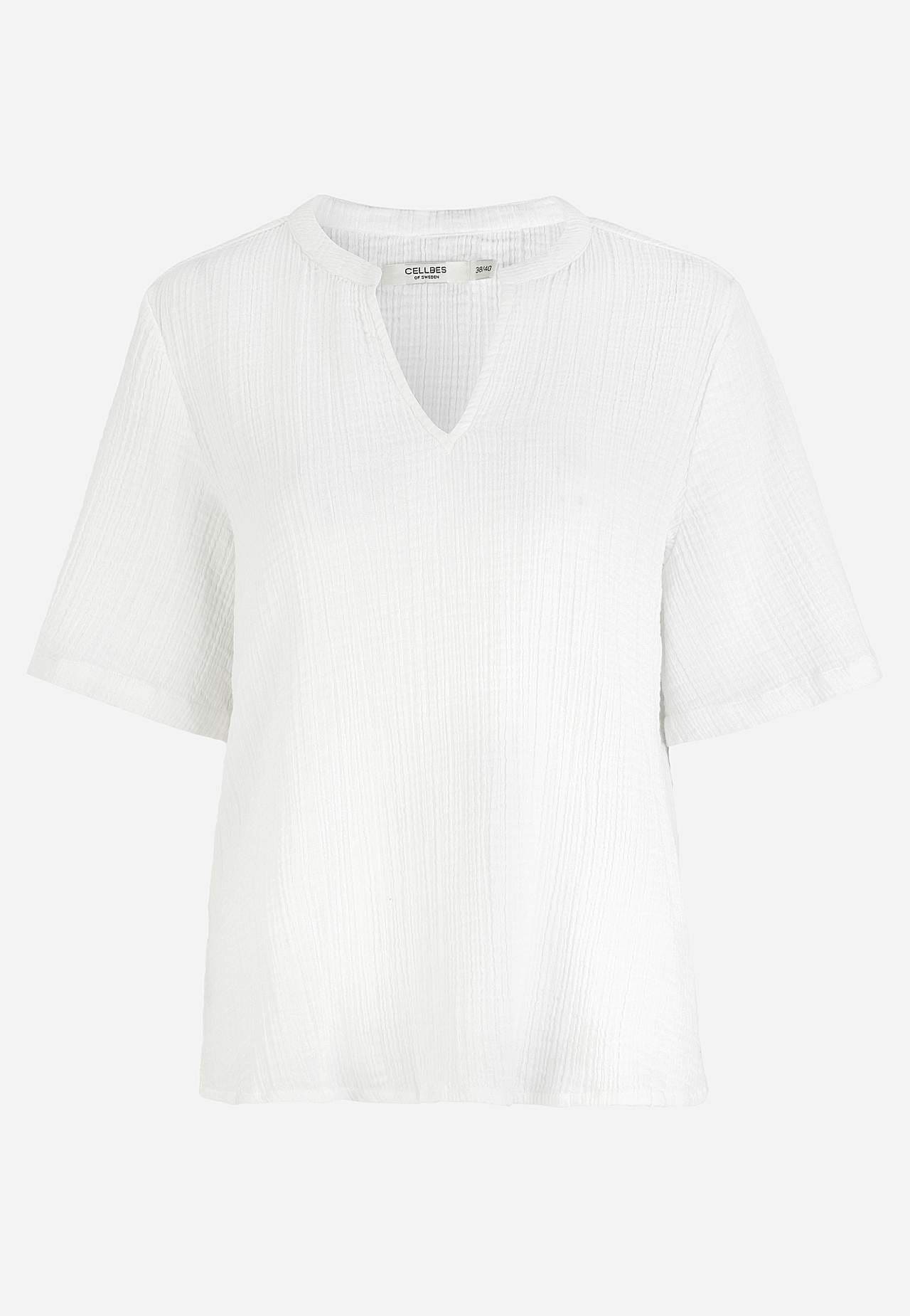 Blus i krinklad bomull