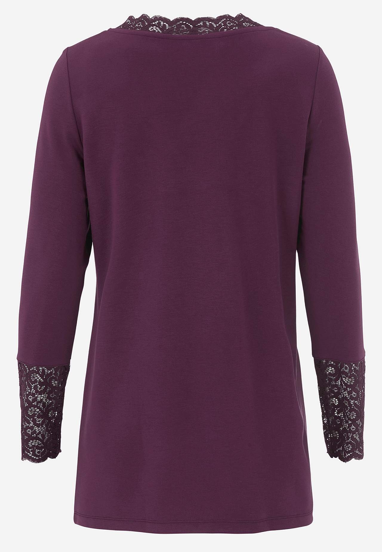 Trikåtunika med spetsdetaljer