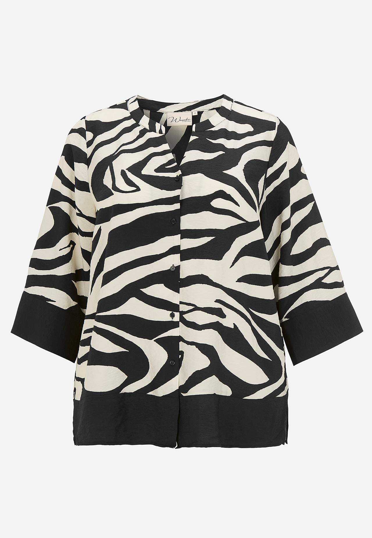 Blus med zebramönster