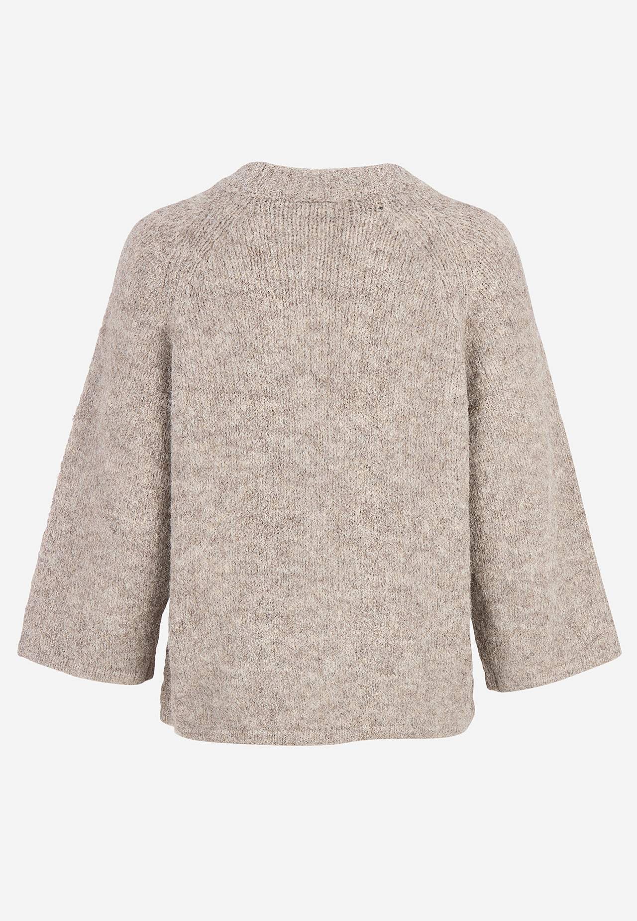 Stickad tröja med raglanärmar
