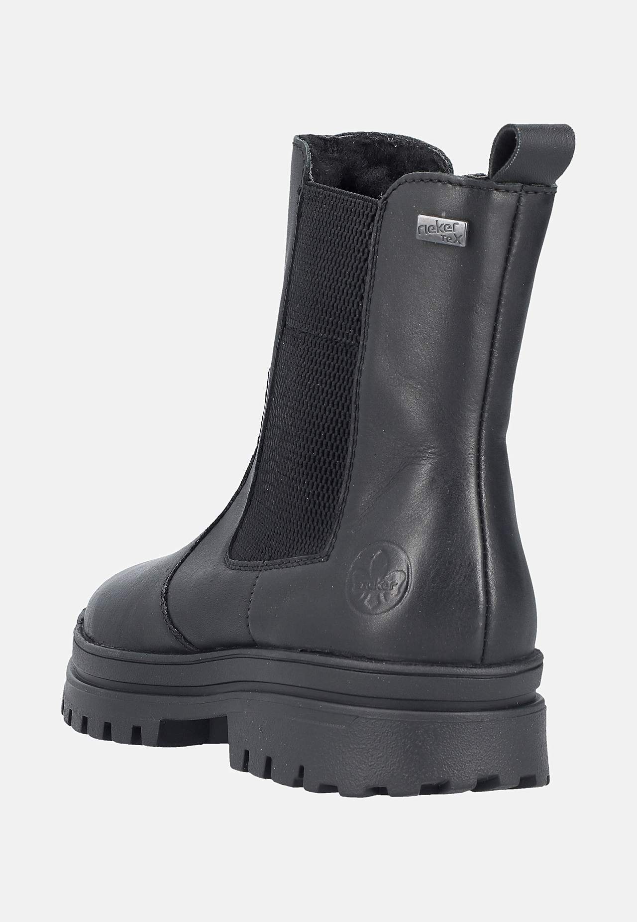 Skinnkänga med infällbara broddar