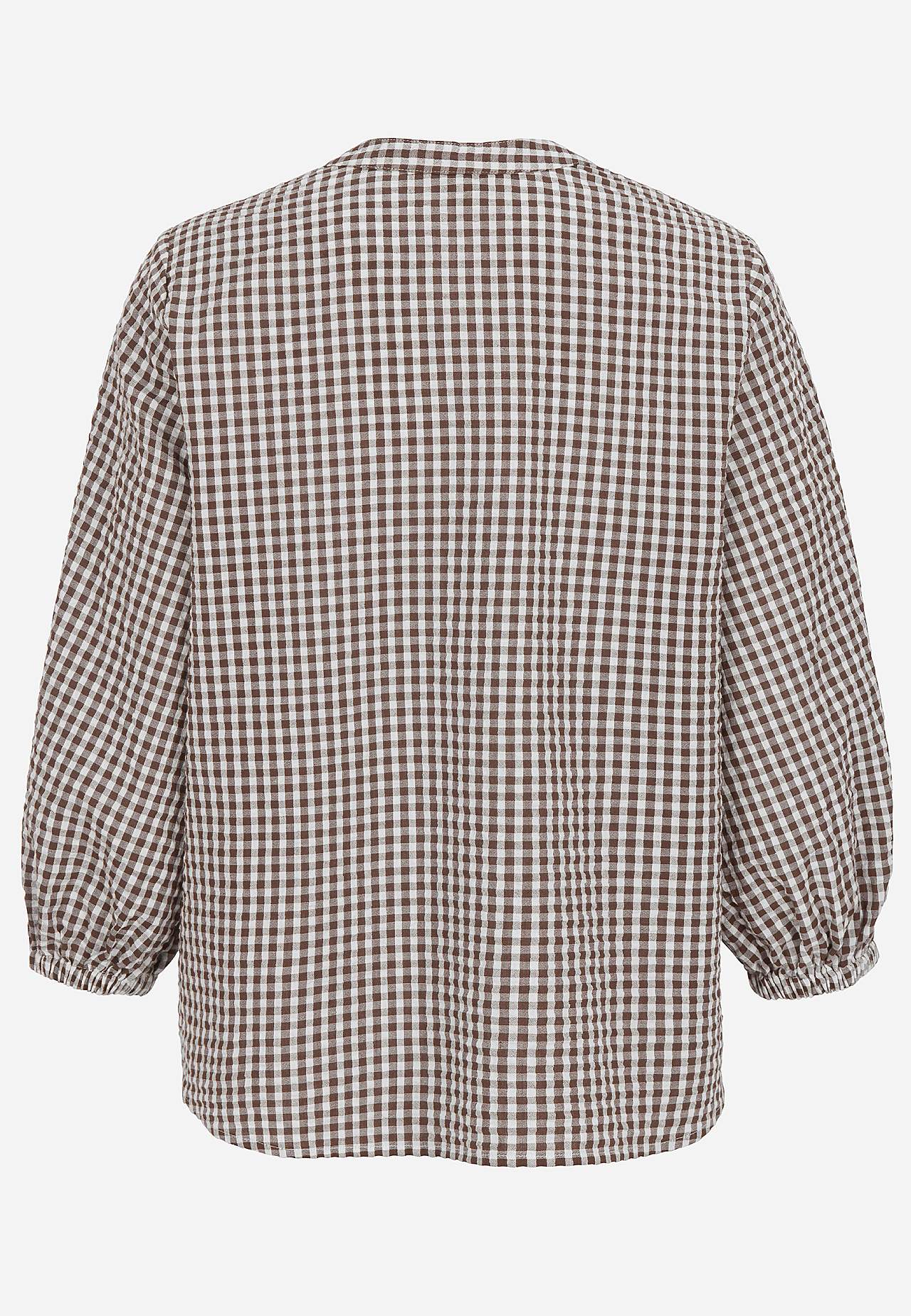 Smårutig blus i bäckebölja