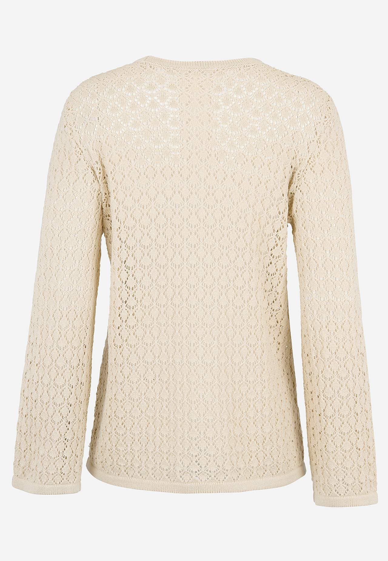 Stickad tröja med hålmönster