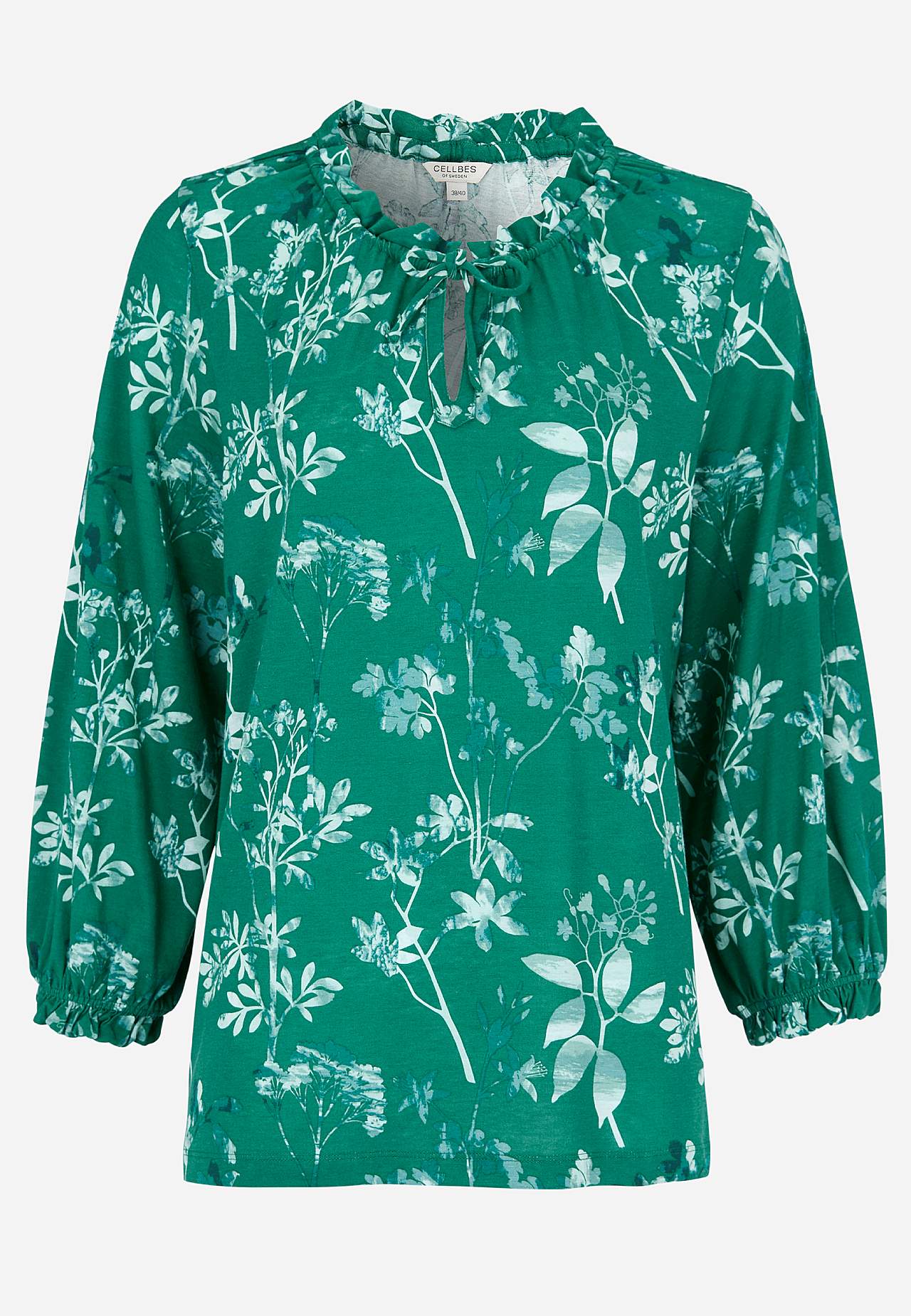 Mönstrad trikåtopp med volangkant