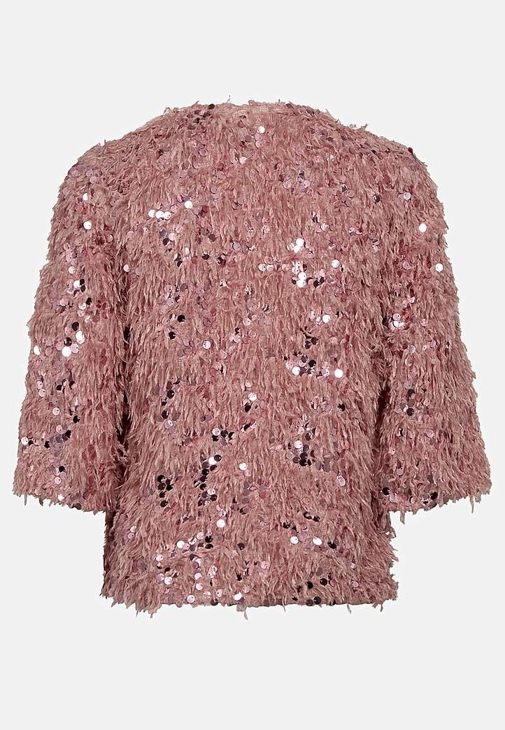 Festtopp med fjäderliknande material och paljetter