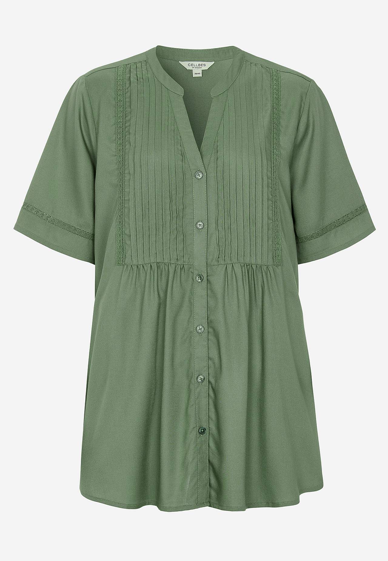 Vävd tunika med spetsdetaljer